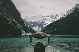 binoculars looking over lake